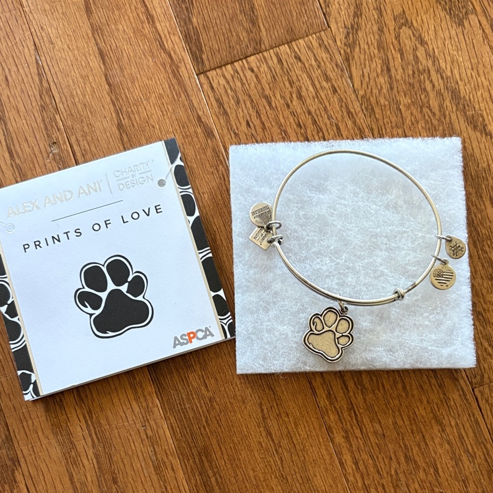 Alex and Ani Silver Bracelet with Tan Paw Charm